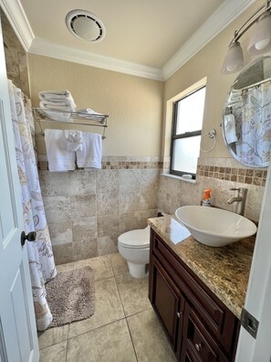 Master bedroom full bathroom. Shower is small 