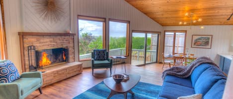 Mid Century Modern decor with a warm wood burning fireplace!