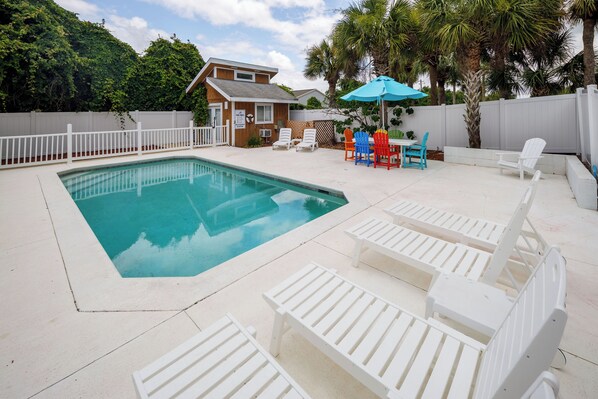 Private swimming pool with large pool deck