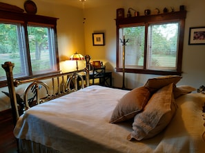 1st floor Master Bedroom w/queen bed and nature viewed through every window