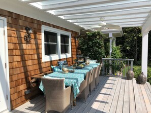 Alfresco dining for 10-14 on the covered deck