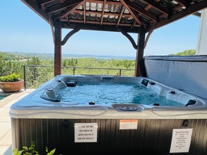 The hot tub overlooks the lake.