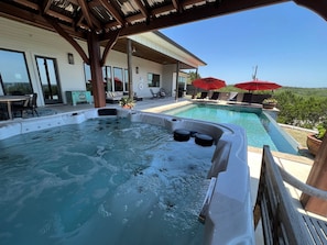 The hot tub is shaded & sheilded by the gazebo.