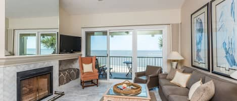 Ocean front living room/14 foot ceilings/marble flooring/herringbone fireplace