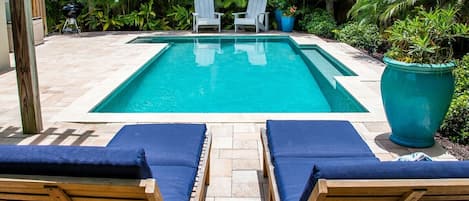 Island Time view to pool behind loungers