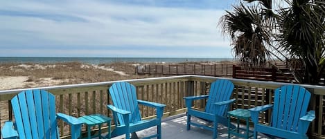 Lots of room to spread out on a large oceanfront deck with swing & picnic table!