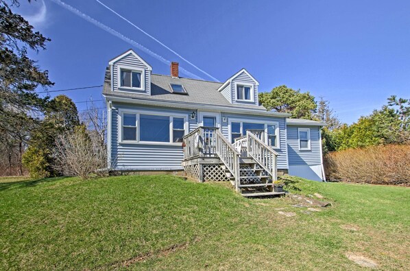 Escape to this quaint vacation rental cottage, nestled on Tidal Cove.