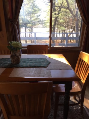 Enjoy morning coffee at table while viewing wildlife down at the lake.
