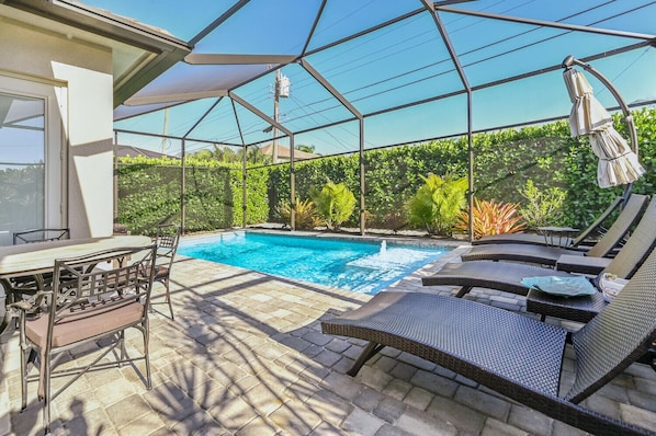 Mature landscaping provides privacy around the lanai for your pleasure.