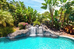 Our relaxing pool featuring a beautiful waterfall 