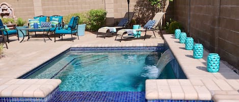 Sanctuary backyard with private pool, spa and variety of seating areas.