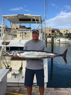 Beautiful fishing boats can be charted 50 yds away.  This 44 lb wahoo was dinner