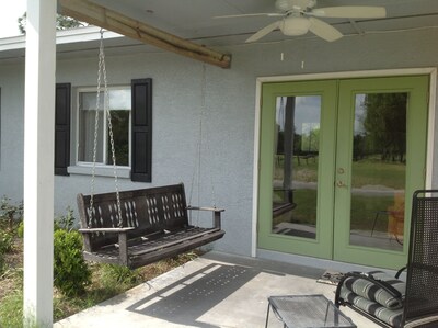 porch swing overlooking the golf course