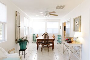 Enclosed Sunroom off Living Area to provide additional living space 