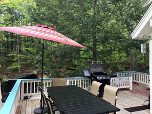 Deck furniture with umbrella and an awesome grill!