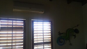 bedroom 1 with tv and a/c