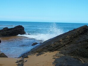 Hidden beach between rocks