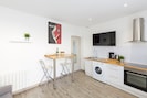 Fully equipped kitchen with TV | 1Stays