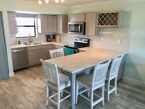 Completely renovated kitchen with quartz countertops 