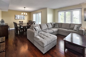 Extensive living space with open concept living / dining room