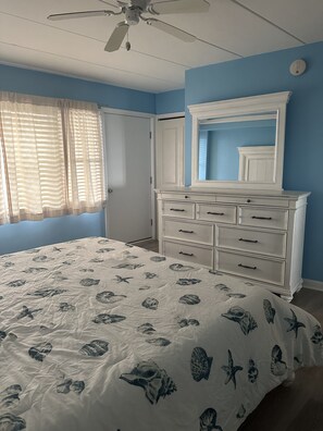 Master bedroom with a private balcony