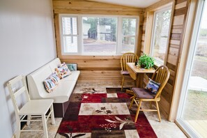 Cozy porch for reading and viewing the lake/River
