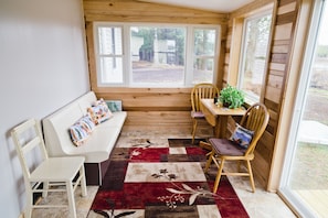 Cozy porch for reading and viewing the lake/River