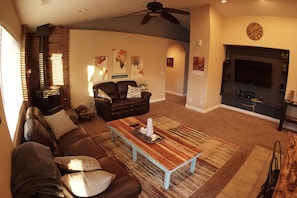 living room with lazy boy leather reclining sofas. 