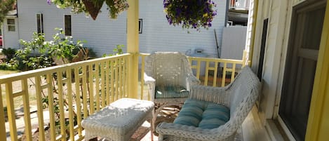 Watch the world go by form our comfortable front porch.