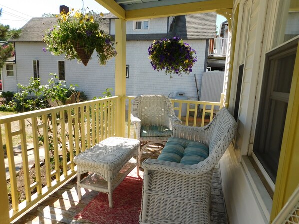 Watch the world go by form our comfortable front porch.
