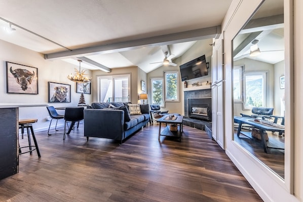 Living area with gas fireplace and flat screen TV