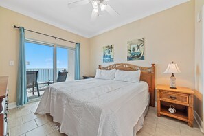 Primary bedroom with balcony access