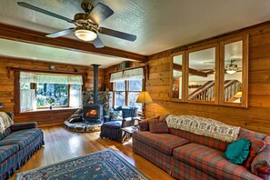 This charming abode features custom design and wood-burning stove.