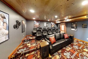 Grab some popcorn and enjoy the massive theater room! Perfect to catch up on a good movie.