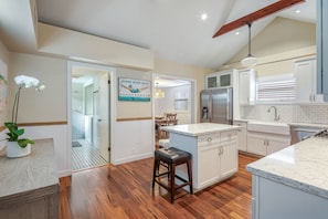 Beautiful kitchen with farm sink and island.