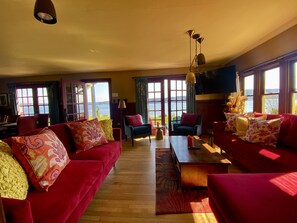 Room for everyone to sit and enjoy the views or watch tv.