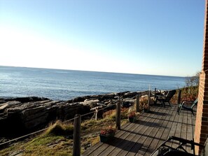 Deck spans width of the cottage and is perfect for watching the waves or stars. 