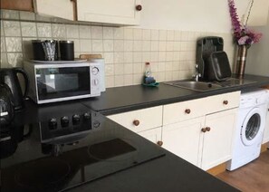 Kitchen area with all essential facilities