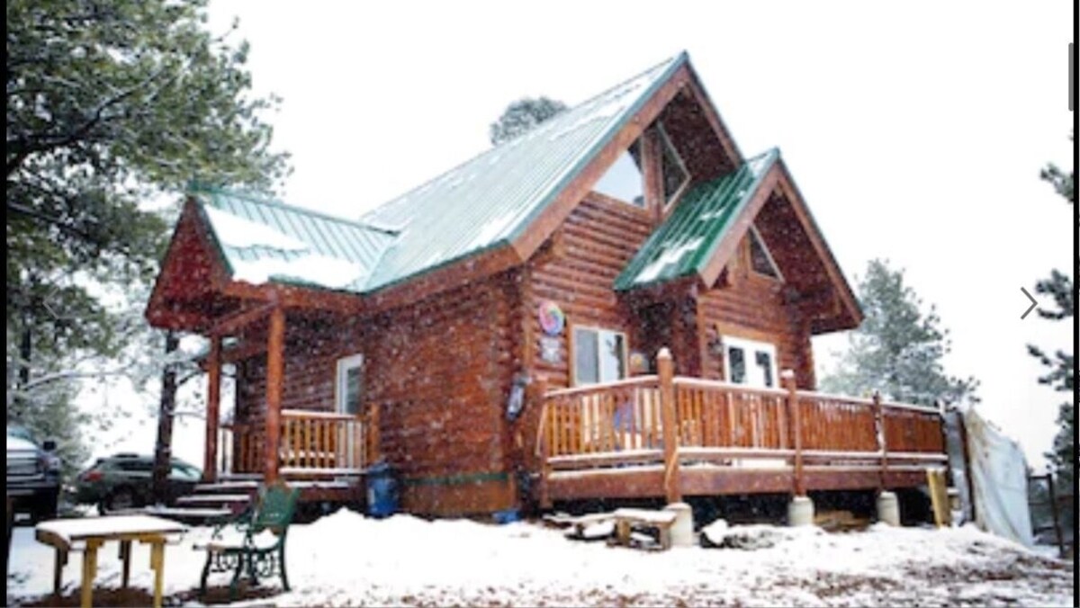 Charming log cabin in the mountains.