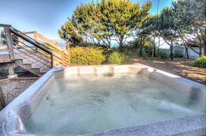 Ocean peaks from the hot tub.