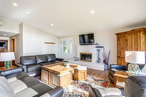Cozy up to the wood burning fireplace and watch TV.