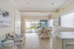 Relax in chairs and chat with your friends in kitchen dining area