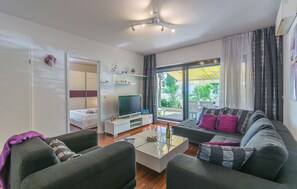 Spacious sunny living room, 50 meters square. 2 air conditioner.