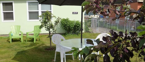 Front yard with table and chairs