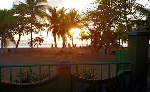Beachfront sunset in front of Casa Cortes in Jaco Beach