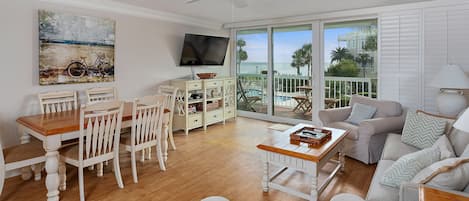 Ocean front living room & balcony with teak furniture 