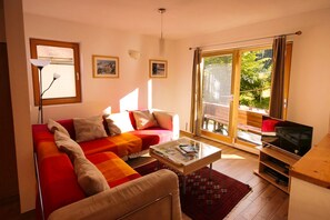 Living room with view of front porch