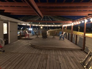 1000 sqft deck in back with fire pit. Great night time atmostphere.