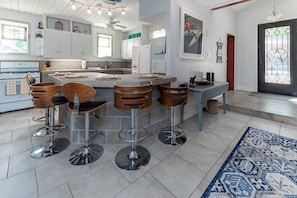 Open kitchen with bart seating