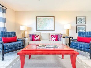 Living Area with Sleeper Sofa, Flat Screen TV and Access to Balcony